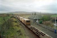 Safeway train rushes south through Scotscalder heading for the moss.<br><br>[Ewan Crawford //2002]