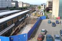 <h4><a href='/locations/H/Haymarket'>Haymarket</a></h4><p><small><a href='/companies/E/Edinburgh_and_Glasgow_Railway'>Edinburgh and Glasgow Railway</a></small></p><p>Work underway on the new Haymarket bay platform 0. View west over the car park from Haymarket station building on 1 July 2006. 3/7</p><p>01/07/2006<br><small><a href='/contributors/Charles_Barclay'>Charles Barclay</a></small></p>