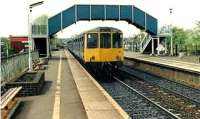 Only a few class 104 DMUs ever ran in Scotland. Bishopbriggs is where I spied this one in 1986. Headed for Queen Street.<br><br>[Brian Forbes //1986]