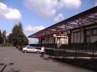 The ramp up to the station is on the trackbed for the Crieff branch. Mrs Georgina Forbes eagerly strides for her train.<br><br>[Brian Forbes 12/08/2006]