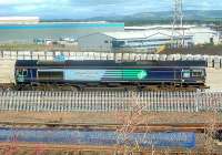 DRS Class 66 66403 at WH Malcolms Elderslie Freight Terminal offloading freight. The freight trains are now using the new concreted part of the terminal.<br><br>[Graham Morgan 06/09/2006]