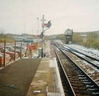 Looking towards the box from the down platform at Cumbernauld in 1998. The short arm at the top was for the main line and the longer arm the refuge siding.<br><br>[Colin Harkins //1998]