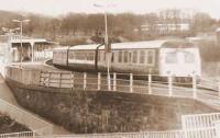 A special hybrid DMU working prior to the introduction of Sprinters, passes through Dunfermline Town.<br><br>[Brian Forbes //1987]