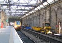 The 0625 ex-Plymouth arrives at Waverley platform 11 on 8 Sept 2006 alongside ongoing works in connection with the second of the new through platforms. This one (Klondyke) opposite the current platforms 10&11, will be built hard against the south wall of the station.<br><br>[John Furnevel 08/09/2006]