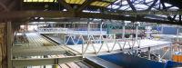 Progress on the new pedestrian bridge under construction between Waverley Steps (currently sealed off) and the western concourse. View east along platforms 1&19 on 8 September 2006. Beyond is a second bridge, linking with the cross-station walkway leading to the south side platforms and Market Street.<br><br>[John Furnevel 08/09/2006]