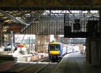 Looking east along Waverley platform 1 on 8 September 2006, with the new Balmoral through platform on the left. The gap provides access for plant and equipment from the yard on Calton Road.<br><br>[John Furnevel 08/09/2006]