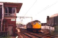 A light 26 passes Bowling box at speed. Bowling box was swept away in the Yoker resignalling. Access by kind permission of British Rail.<br><br>[Ewan Crawford //1990]