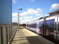 A train for Bathgate preparing to restart after calling at Edinburgh Park on a beautiful sunny day in September 2006.<br><br>[John Furnevel 08/09/2006]