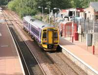 A Queen Street service picks up passengers at Maryhill in August 2006 immediately after coming off the Anniesland line at Maryhill Park Junction.<br><br>[John Furnevel 14/08/2006]