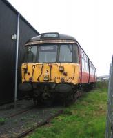 303032 (B end) standing in the rain at Boness on 6 September 2006.<br><br>[John Furnevel 06/09/2006]