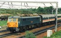 87033 approaching Carstairs with the 1000 Glasgow Central - Euston in 1985. Formerly called Royal Scot.<br><br>[Brian Forbes //1985]