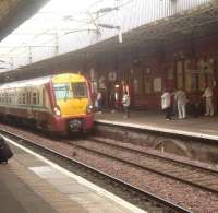 Ayr bound 334026 arriving at Paisley Gilmour Street <br><br>[Graham Morgan 12/09/2006]