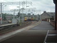 334034 departing Paisley Gilmour Street for Glasgow passes Stranraer bound 156431<br><br>[Graham Morgan 12/09/2006]