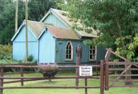 In the event of delays and cancellations on the Cornhill branch appropriate facilities for prospective passengers waiting at Mindrum were provided at the station entrance, seen here in September 2006.<br><br>[John Furnevel 02/09/2006]