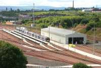 Part of Eastfield depot looking southwest in August 2006. The line linking Cowlairs East and North Junctions can be seen above the shed.<br><br>[John Furnevel 27/08/2006]