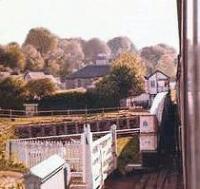 Signalman exchanges tablet at Clachnaharry Swing Bridge over The Caledonian Canal.<br><br>[Brian Forbes /05/1983]