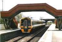 New footbridge at Cumbernauld. Looking at the farther bridge from which steps once formed the entrance to the station.<br><br>[Brian Forbes //2000]