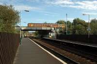 Over the top: southbound single-car sprinter crosses over Shotton LL station on the approach to Shotton HL station. View looks east.<br><br>[Ewan Crawford 13/09/2006]