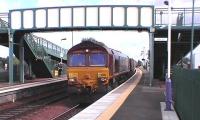 66203 quietly pulls the Longannet empties through Camelon, this service will be diverted via Stirling in the new year.<br><br>[Brian Forbes 19/09/2006]