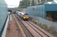 DRS 66408 moves a container train away from the W H Malcolm depot at Grangemounth in September 2006.<br><br>[John Furnevel 21/09/2006]