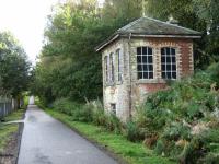 Another view of the signal box looking in the Dunfermline direction.  The remains of the waiting room are hidden in the trees in the centre.<br><br>[Mark Poustie 23/09/2006]