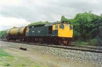 27005 hauls a bogie tank northwards, through Greenhill to Larbert.<br><br>[Brian Forbes /06/1988]