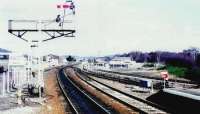 Aviemore North 1. Looking north, in Dec.1987 Although a three platform station, one, Platform 1 (nearest camera) is used unless a crossing is required. Note the Rapsons decker.<br><br>[Brian Forbes /12/1987]