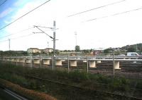 Grab shot from a passing train showing new stabling roads under construction on the north side of Slateford yard on 26 September 2006. In the background is Meggetland, home of Boroughmuir Rugby Club. <br><br>[John Furnevel 26/09/2006]