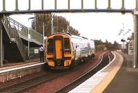 Train from Glasgow Queen Street via Cumbernauld calls at Camelon, its last stop before Falkirk Grahamston.<br><br>[Brian Forbes 21/09/2006]