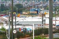 In the SE corner of Slateford yard the CE depot remains active. View across the yard beyond the new stabling roads to the CE sheds and large collection of PW vehicles located there. In the foreground is the line from Slateford Jct to Craiglockhart Jct.<br><br>[John Furnevel 27/09/2006]