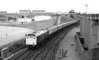 Class 25 7590 at the rear of a Glasgow - Edinburgh PP service passing Eastfield in September 1972.<br><br>[John McIntyre 16/9/1972]