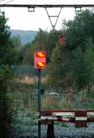From electrified mainline to footpath: looking east from the buffer stop at Hadfield towards Woodhead.<br><br>[Ewan Crawford 01/09/2006]