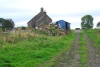 Looking up Nanny Mayors Incline at Waskerley. The building is in fact a church and not an engine house or similar. Line to Burnhill to the left and to Stanhope to the right.<br><br>[Ewan Crawford 26/09/2006]