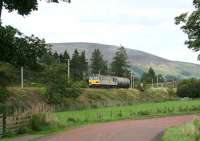 The most powerful and sophisticated locomotive built in the UK at that time, the 6,760 HP dual voltage class 92, carried a price tag of almost £3m per unit. Here one of the class takes 2 tanks south through Lamington in September 2006.<br><br>[John Furnevel 01/09/2006]