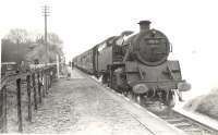 Buchan tanks. 80111 at Logierieve on down passenger.<br><br>[G H Robin collection by courtesy of the Mitchell Library, Glasgow 15/05/1959]