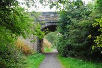 Looking to Blackhill at Ebchester. The platforms have gone but roadbridge remains. The station yard is now a carpark as the railway is now a walkway.<br><br>[Ewan Crawford 26/09/2006]