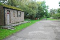 A toilet block (closed) now occupies the goods yard at Shotley Bridge on the line of a loading dock. View looks north.<br><br>[Ewan Crawford 26/09/2006]