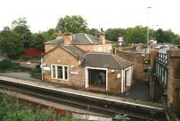 Buildings on the Edinburgh bound platform at Polmont in September 2006, looking north.<br><br>[John Furnevel /09/2006]