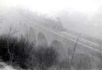 Last day of passenger service between Kilmacolm and Princes Pier. Very foggy. 42238 with 12.17 up on Devol Viaduct.<br><br>[G H Robin collection by courtesy of the Mitchell Library, Glasgow 31/01/1959]