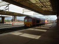 66139 passing through Paisley Gilmour Street with coal empties heading for Hunterston<br><br>[Graham Morgan 28/09/2006]