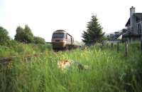 Highland Chieftain heads north from Aviemore in the evening of 04 July 1991.<br><br>[John McIntyre 04/07/1991]