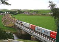 The 10.31 Coatbridge - Crewe containers crossing the Clyde at Crawford in October 2006.<br><br>[John Furnevel 11/10/2006]