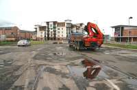 Changed days indeed. Looking west from the now closed Constitution Street entrance to Leith docks in September 2006. Plush looking flats are much in evidence and a Casino now stands on the right. Part of the large Ocean Terminal retail development is just visible in the right background.<br><br>[John Furnevel 12/09/2006]