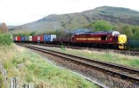 A 37 moves to the end of the siding at Glen Douglas with a Government train before seeking to leave for the south. The first wagon is a buffer wagon. <br><br>[Ewan Crawford 04/10/2006]