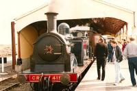 What is this? Haymarket train shed newly in position. ex-CR 0-4-4T No 419, hauling the embryonic Norwegian Train. The original service went as far as Kinneil. <br><br>[Brian Forbes /05/1987]