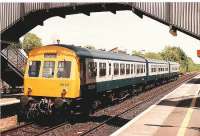 Train for Dunblane calls, summer 1987, the colour light signal has now been moved 100 yards further on.<br><br>[Brian Forbes /08/1987]