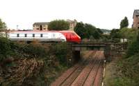 Looking north from the old Caledonian bridge at the east end of Slateford Yard in October 2006 with a Voyager having just crossed the parallel bridge en route from Waverley to Carstairs. Down below, the sub heads for Gorgie East. <br><br>[John Furnevel 05/10/2006]