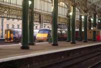 91112 City of Durham leaving Glasgow Central with the 0800 Kings Cross service alongside 156447 heading for East Kilbride<br><br>[Graham Morgan 04/10/2006]