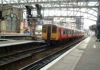 314202 departing on a Cathcart Circle service<br><br>[Graham Morgan 03/10/2006]