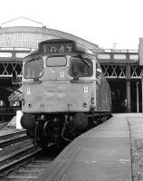 27105 takes an Edinburgh train out of Glasgow Queen Street in March 1974.<br><br>[John McIntyre /03/1974]